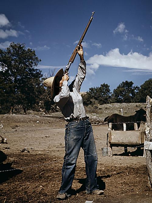 Nell Leathers, Homesteader, Shooting Hawks Which Have Been Carrying Away Her Chickens