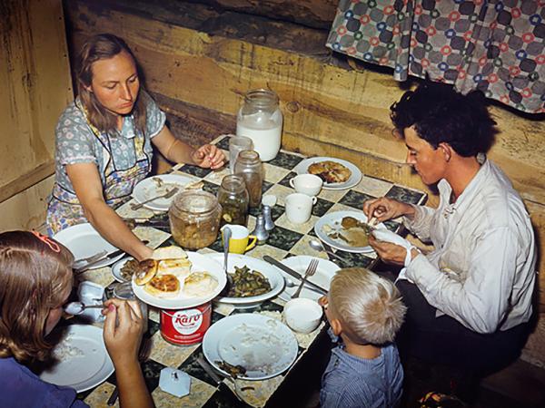 The Fae and Doris Caudill Family, Eating Dinner in Their Dugout